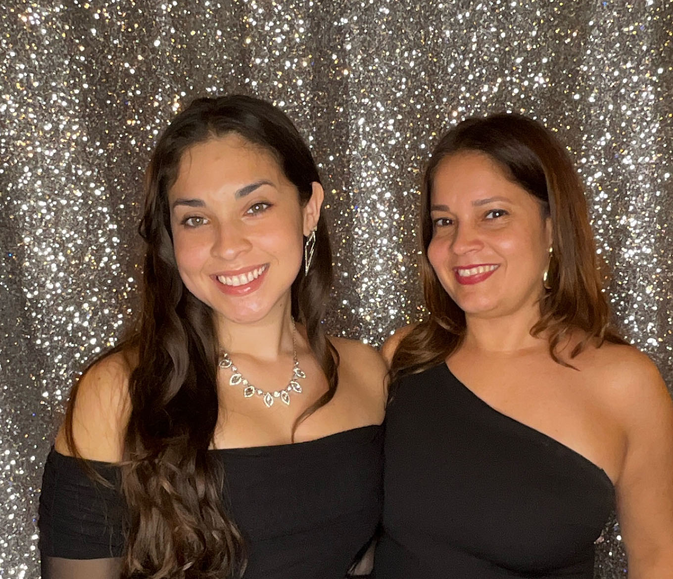 Teens posing at a Sweet 16 photobooth in Northeast Florida